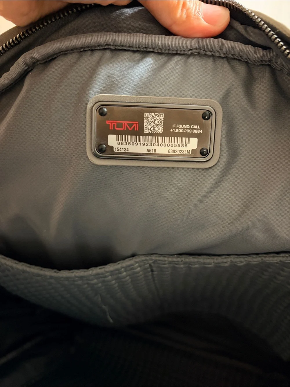 Tumi sleek leather
